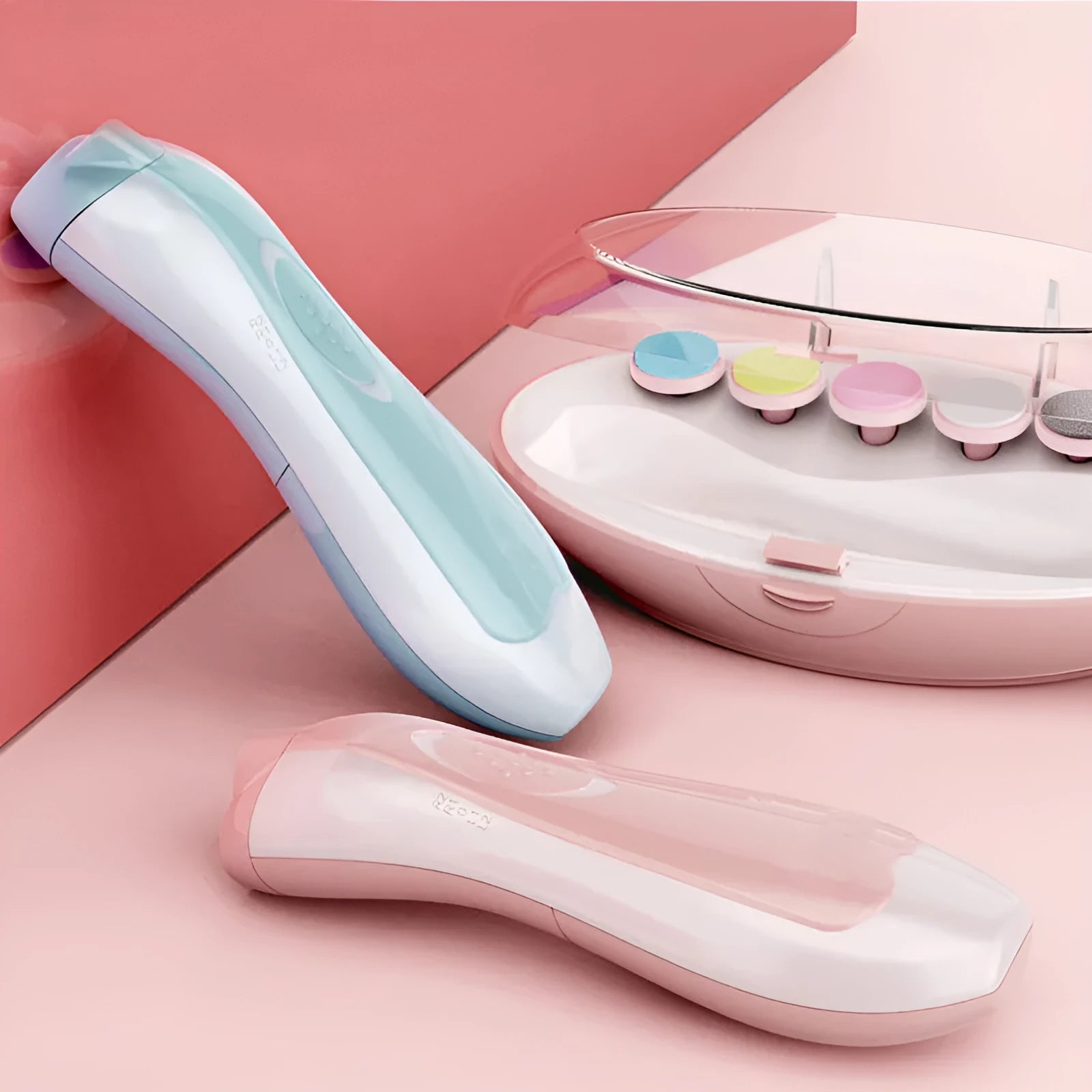 Ultra-quiet electric baby nail polisher in pink, showing compact design with button.