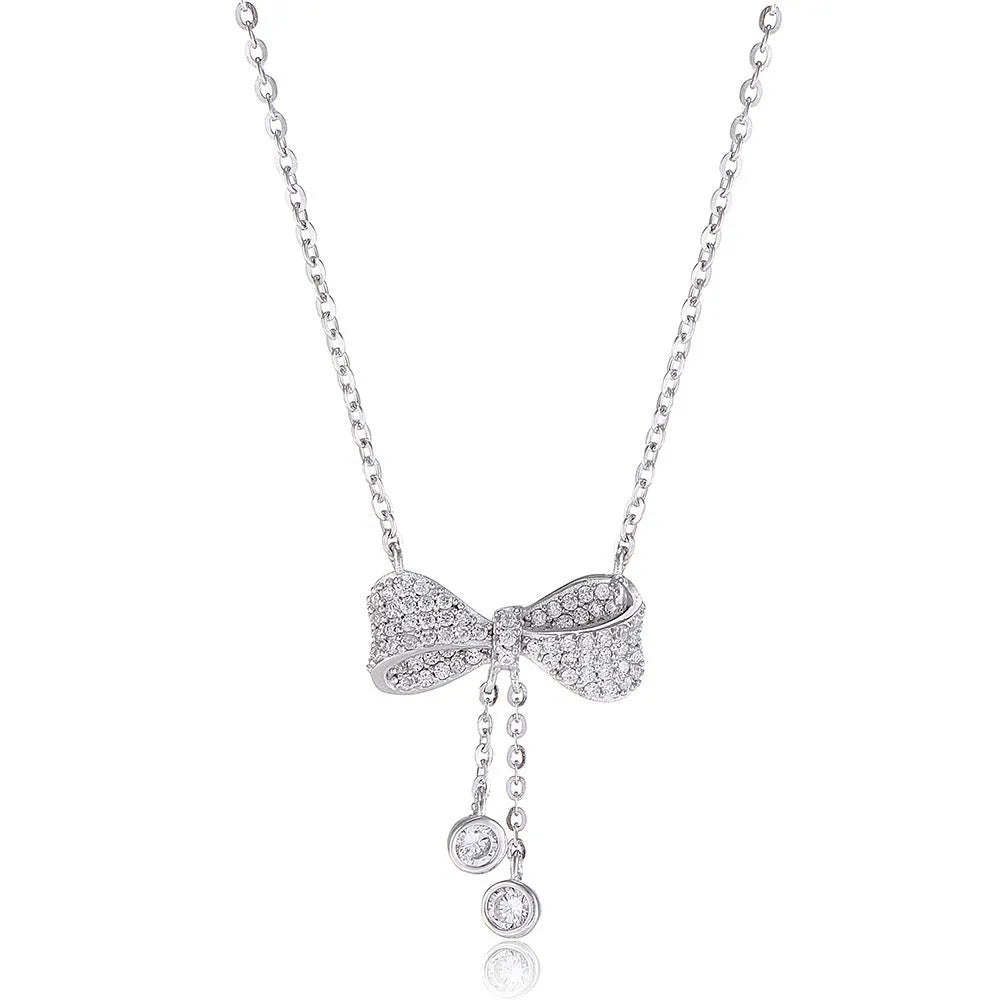 925 sterling silver necklace with a bow pendant on a silver O-ring chain.