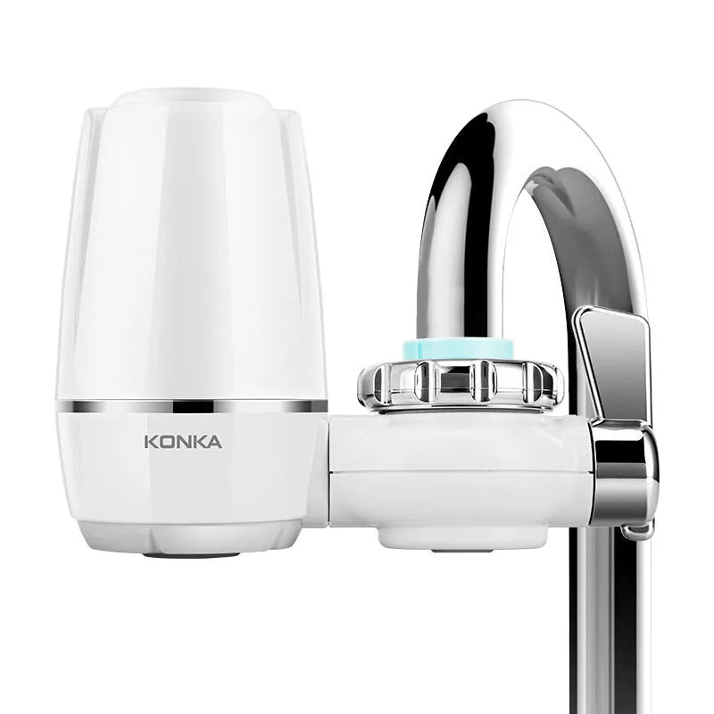 White kitchen tap water filter with ceramic cartridge and universal adapter fittings