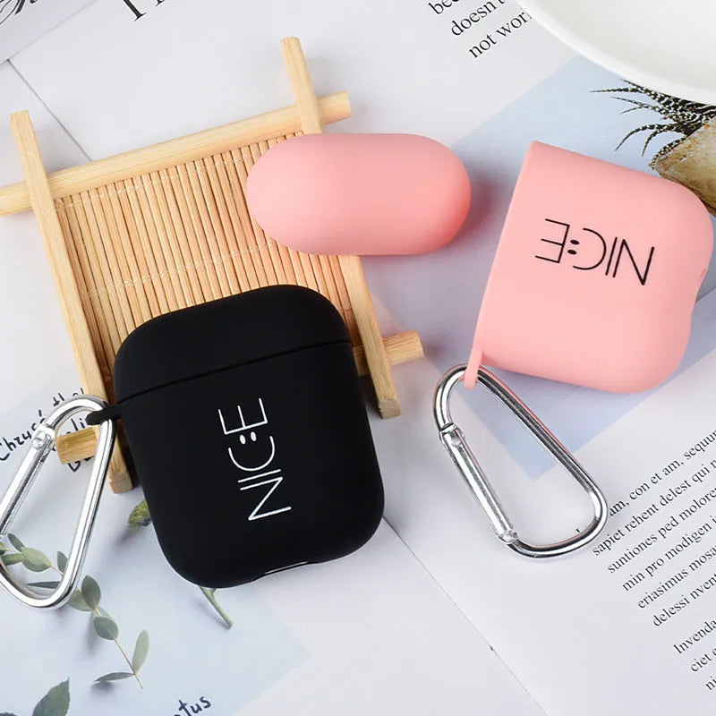 Black and pink AirPods protective case covers with decorative flower, love, smiley face designs