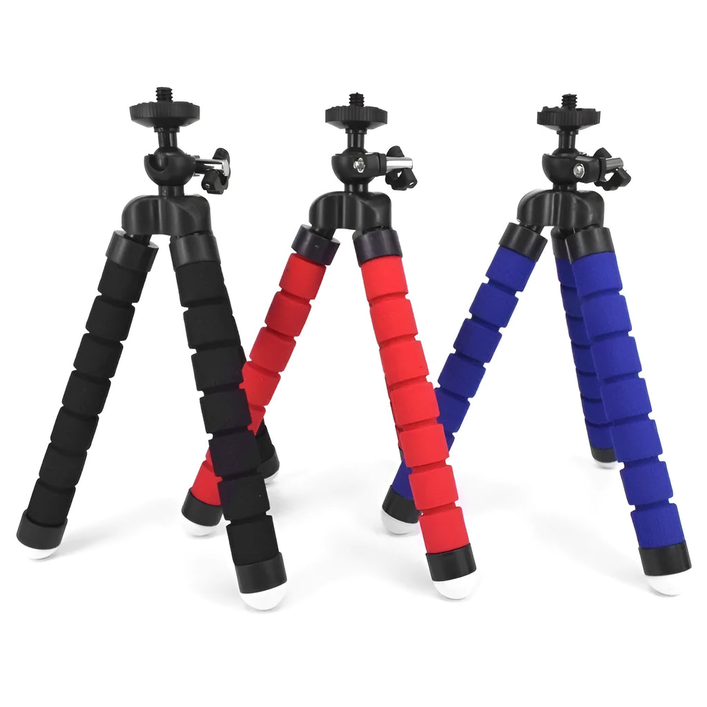 Black flexible octopus tripod with wrapped legs next to a smartphone