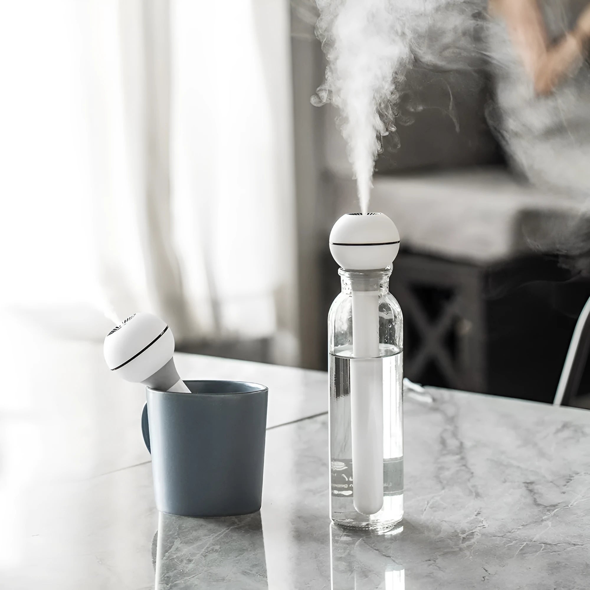 Magic wand style ultrasonic humidifier with columnar design in pink or white colours