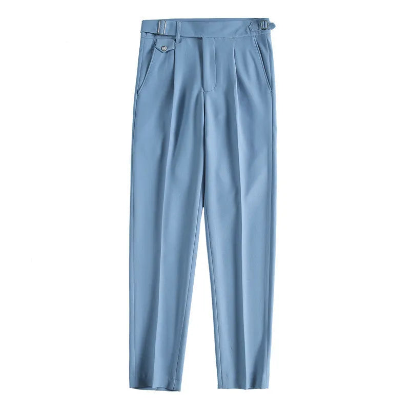 Men's straight-leg casual trousers in solid colours including black and grey, laid flat.