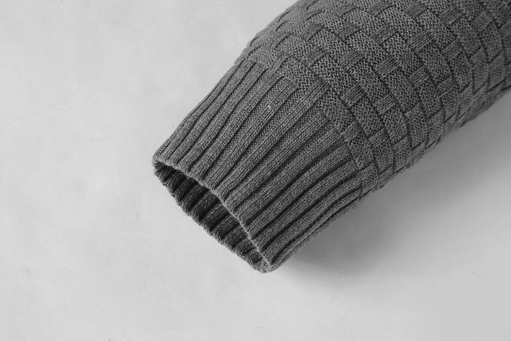 Men's black cotton polyester blend hooded sweater laid flat, showing the front design and hood.