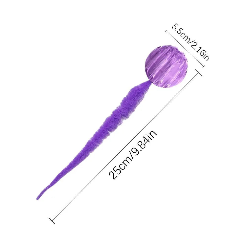 Interactive cat ball toy with plush tail in green, pink, and purple on white background