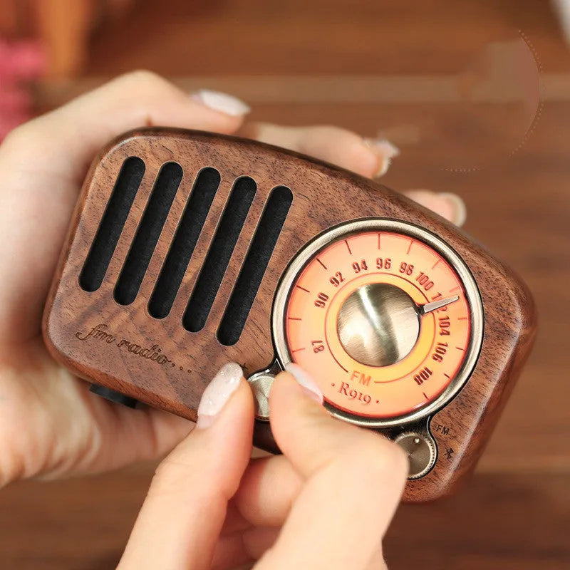 Retro wooden wireless mini speaker in cherry wood or walnut finish showing compact dimensions