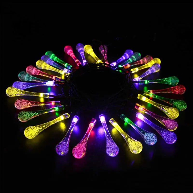 Solar-powered water drops LED string lights for outdoor garden decoration with waterproof design