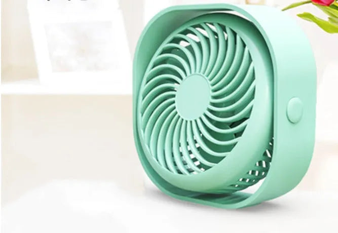 USB charging fan with alarm clock design showing 360-degree rotation feature in blue colour
