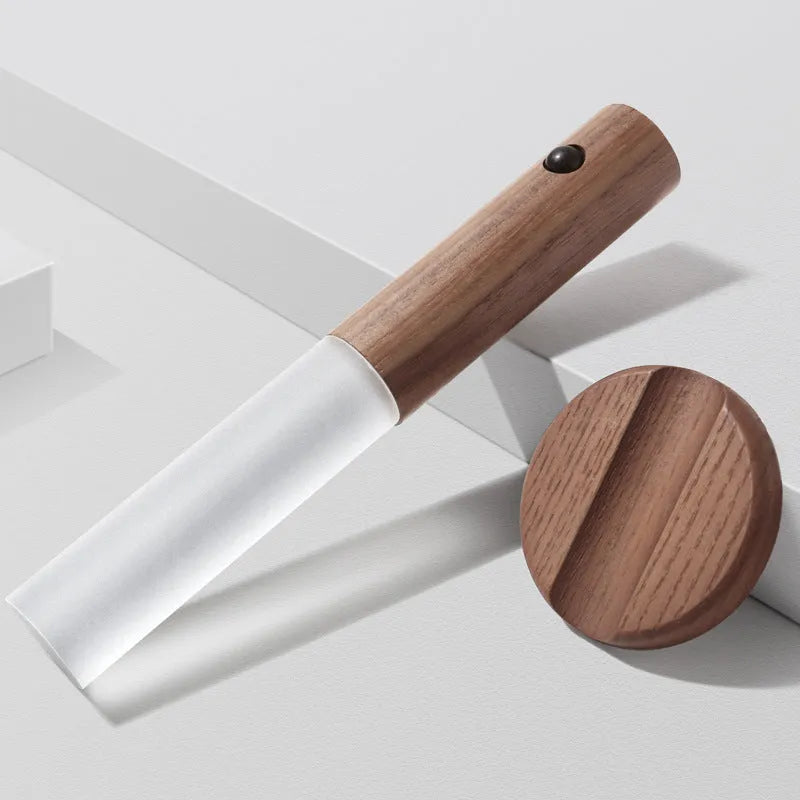 Smart sensor LED desk lamp made of solid wood and organic glass on a wooden desk