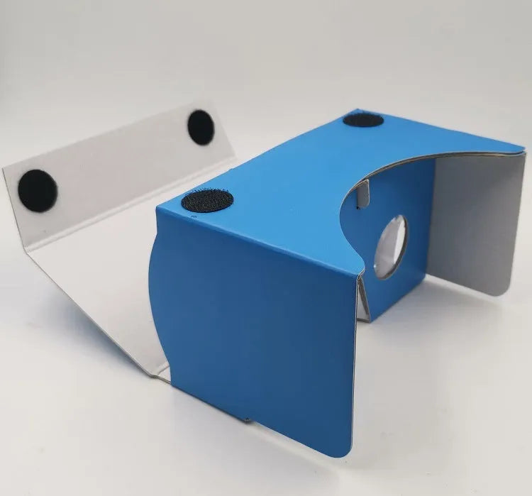 Pink and white cardboard VR glasses viewer for smartphones with 3D lenses.