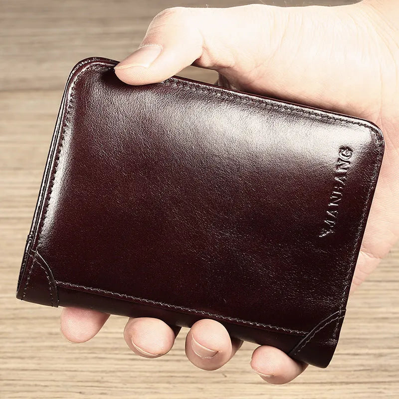 Men's leather wallet showing multiple internal compartments including card slots and change purse