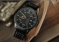 NAVIFORCE men's quartz watch with date display, leather strap, and military-style dial on a wrist