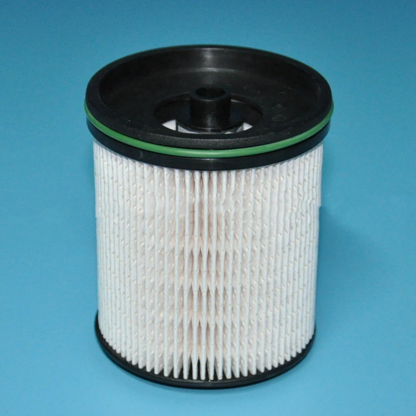 Diesel fuel filter element with gasket for Vauxhall and Opel Astra models showing 106mm height