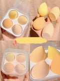 Set of four coloured makeup sponge eggs in grape, mango, mint, and peach peach, each measuring 6cm.