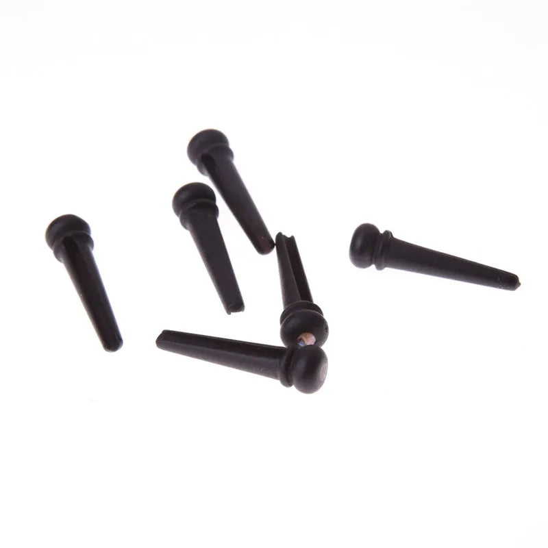 Six matt black ebony bridge pins for folk acoustic guitars with 5.3mm bayonet diameter