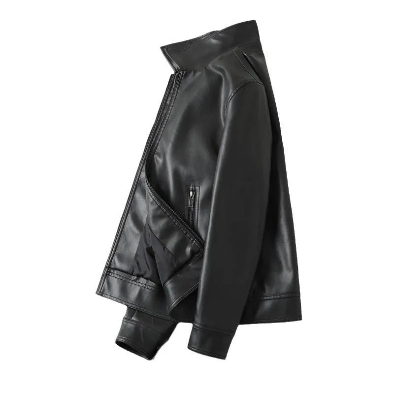 Black men's loose fit PU leather jacket with zipper pockets on a model.