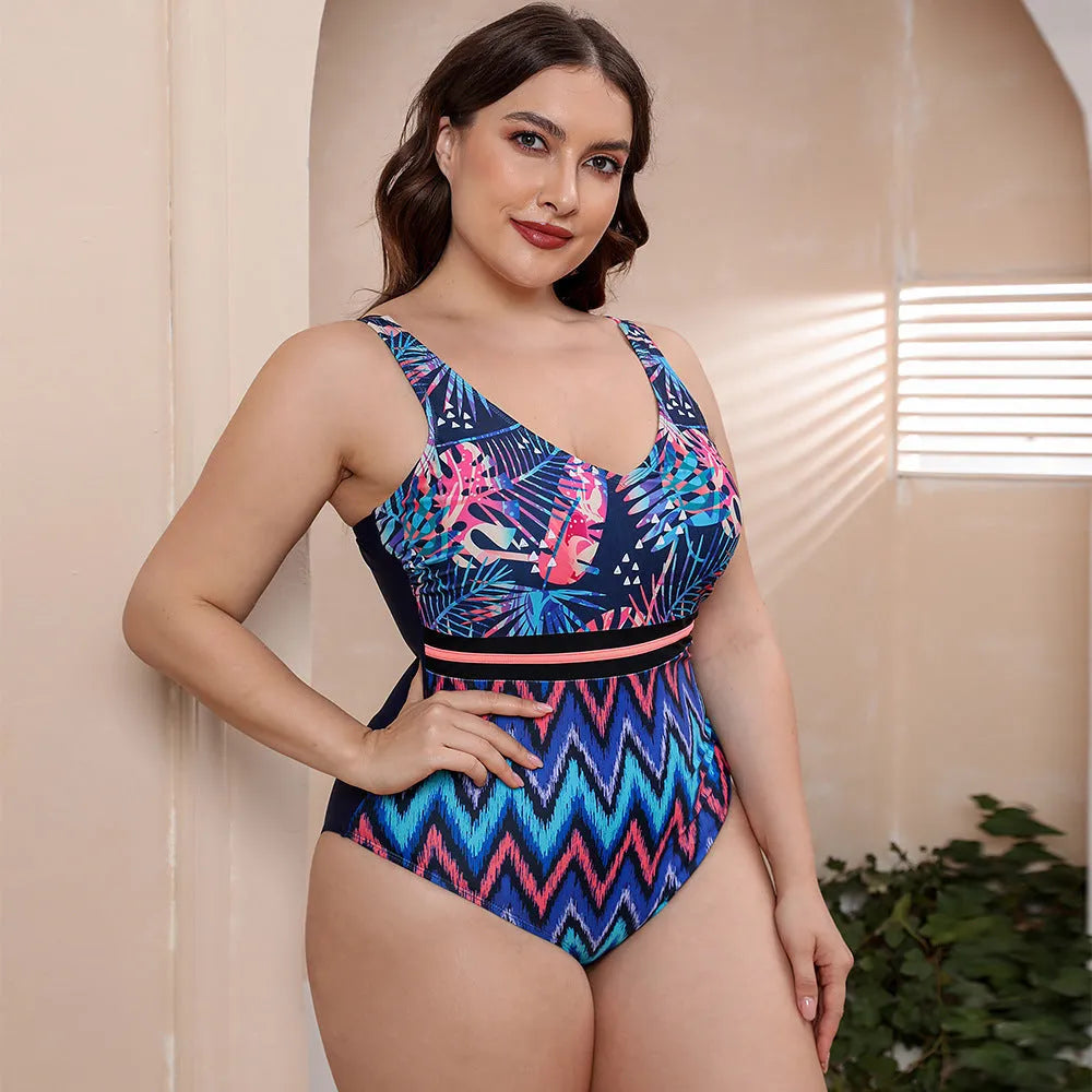 Women's blue striped one-piece vest swimsuit with spaghetti straps on a mannequin.