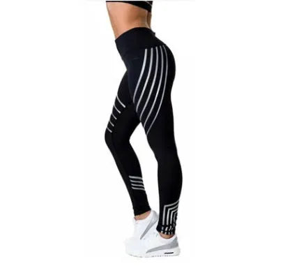 Women's black workout leggings with glow in the dark print pattern for fitness activities