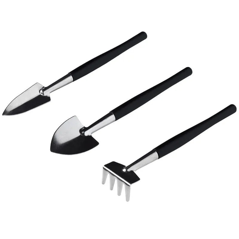 Black miniature gardening tool set with 16 pieces including tweezers, shovels, watering bottle, and cushion for succulent care
