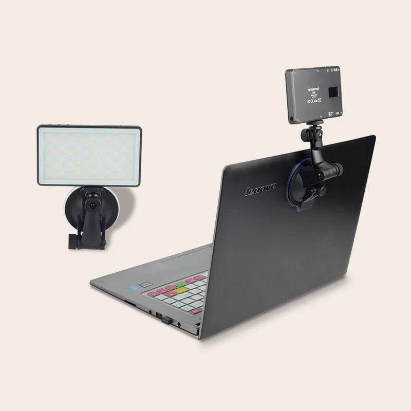 Black aluminium LED conference light with OLED screen, for laptop video call lighting