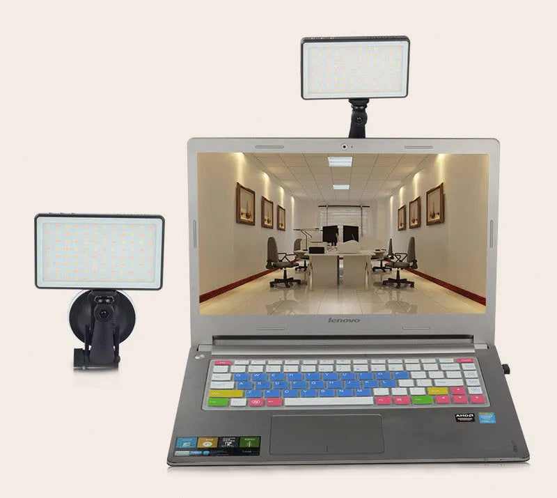Black aluminium LED conference light with OLED screen, for laptop video call lighting