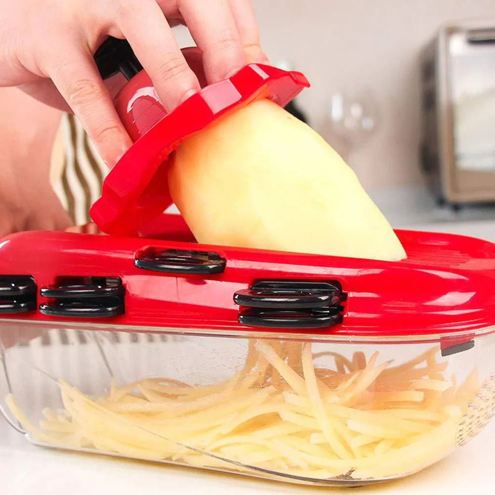 Red multifunctional vegetable cutter set with 7 stainless steel blades, hand guard, and PET container