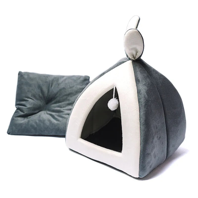 Grey cloth cat house with removable fleece interior cushion for cats or small dogs.