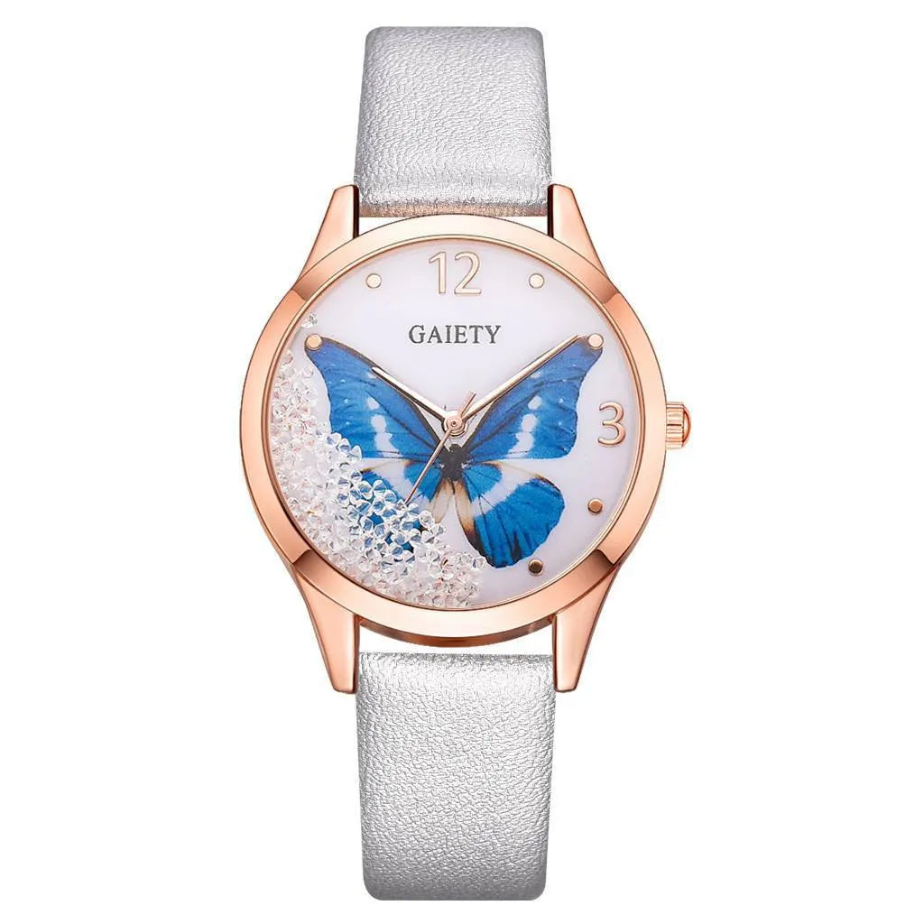 Gaiety women's wristwatch with rhinestone butterfly decoration on a round dial and black leather strap.