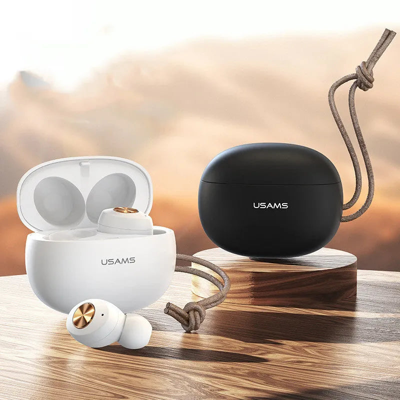 Wireless Bluetooth mini TWS earbuds and compact charging case in black, green, or white colour options.