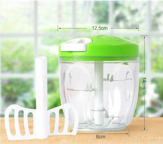 Green manual kitchen chopper with three blades, 500ml capacity, and compact design