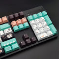 Green Cherry mechanical keyboard keycap with wireless USB connector in official packaging