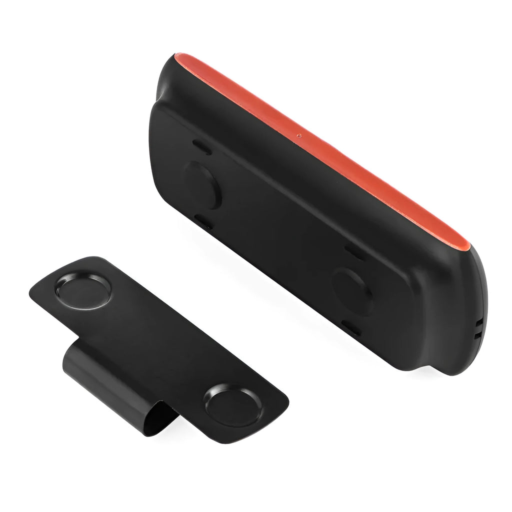 Orange Bluetooth car hands-free speaker clipped onto a sun visor with wireless smartphone pairing for 3W audio output