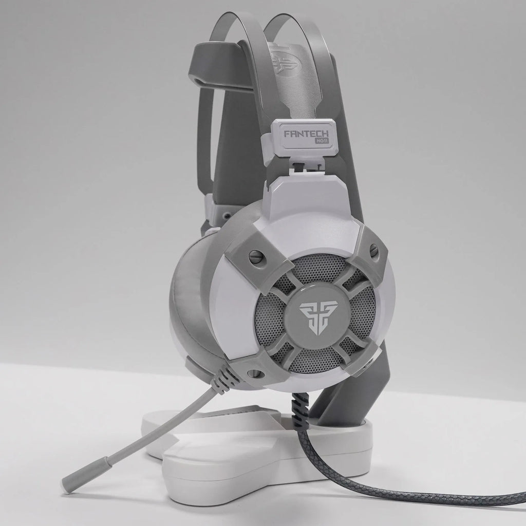 Black FANTECH HG11 USB gaming headset with RGB lighting on earcups and a long cable.