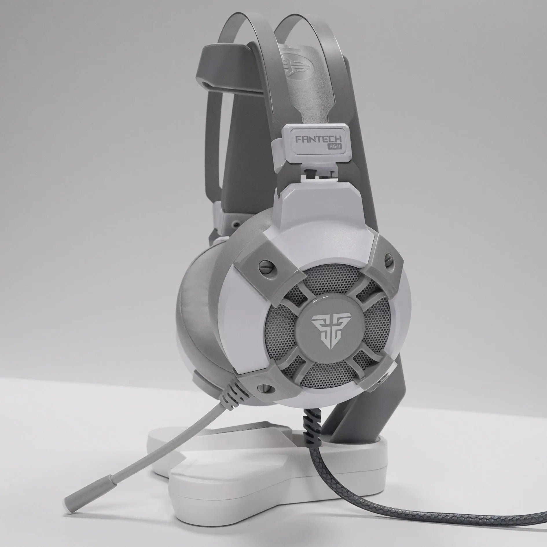 Black FANTECH HG11 USB gaming headset with RGB lighting on earcups and a long cable.