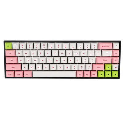 68-key PBT mechanical keyboard keycap set spread out, showing colour options like blue, pink, grey, and yellow.