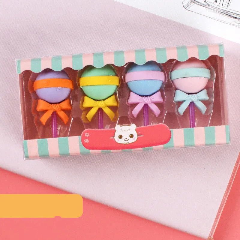 Three sets of cartoon food-shaped erasers for kindergarten children including ice cream cones, doughnuts, and lollipops
