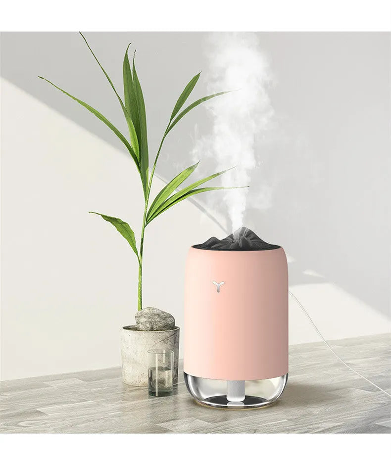 White Magic Flame ultrasonic desktop humidifier with columnar shape and single mist outlet
