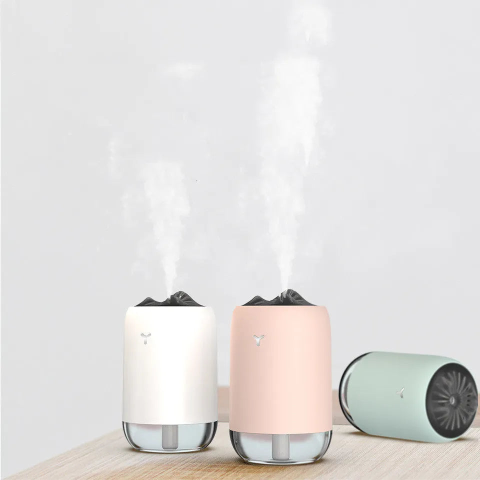 White Magic Flame ultrasonic desktop humidifier with columnar shape and single mist outlet