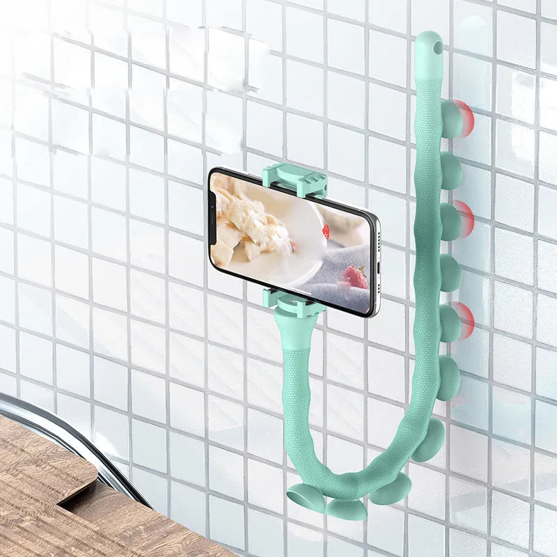 Flexible black phone holder with bendable arm and suction cup mount showing 360-degree rotation
