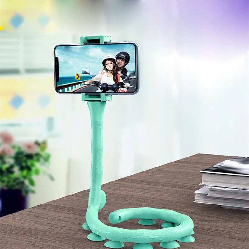 Flexible black phone holder with bendable arm and suction cup mount showing 360-degree rotation