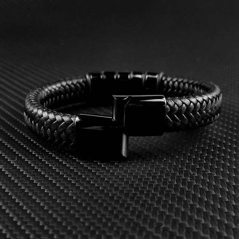 Custom family name bracelet with leather strap, titanium and stainless steel geometric charm, black finish, double-safety-clasps