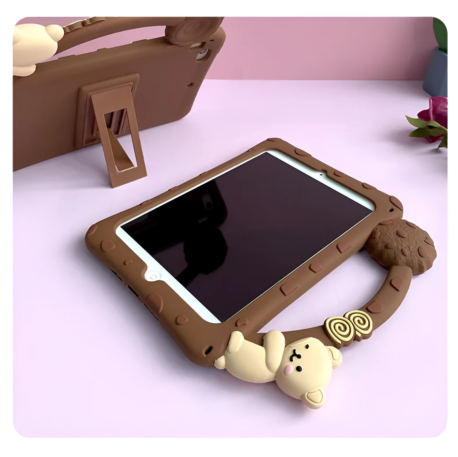 Brown cartoon-style silicone iPad case shown with integrated bracket stand deployed.