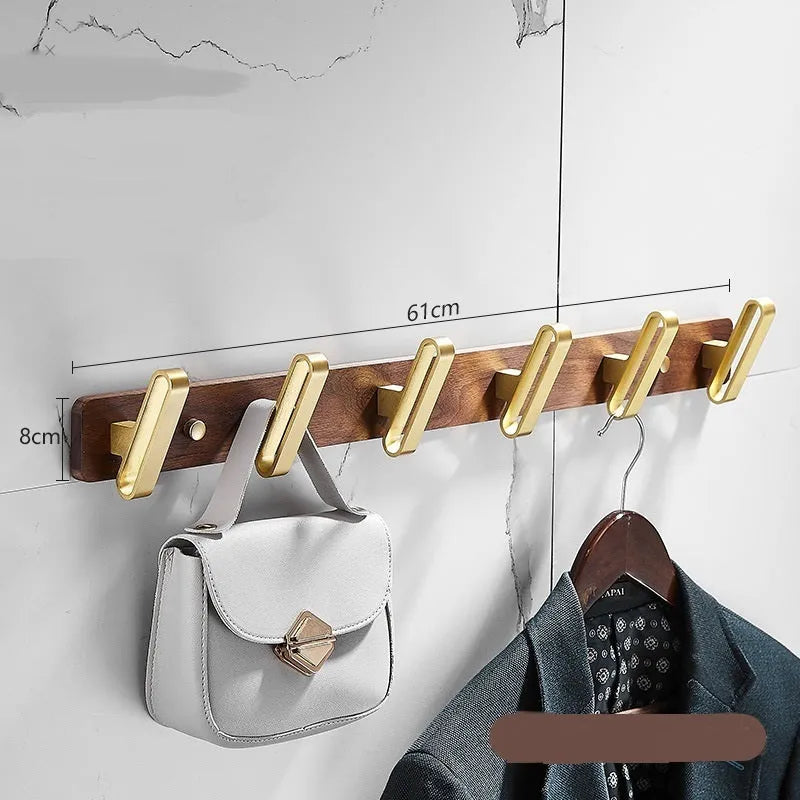 Black walnut aluminium clothes hooks with brass wire drawing finish on wall