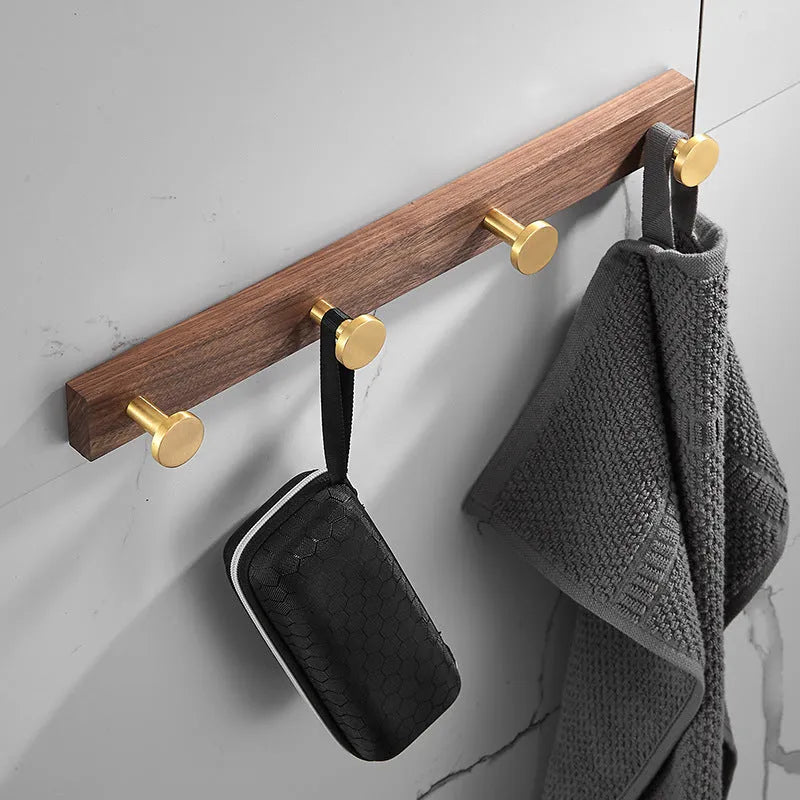 Black walnut aluminium clothes hooks with brass wire drawing finish on wall