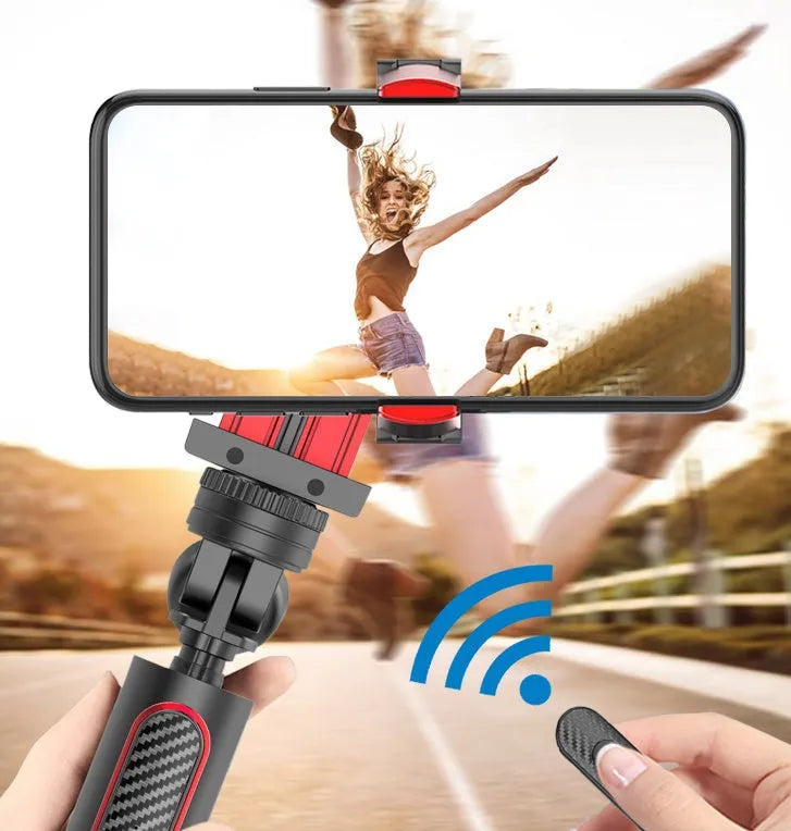 Black aluminium video stabiliser tripod extended to full height with iPhone mounted in clamp