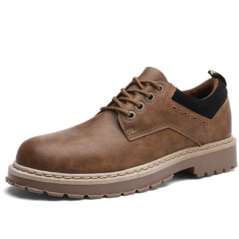 Men's black casual shoes with round toe, flat rubber sole, and front-tie laces.