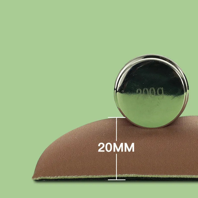 Green kiwi fruit shaped soft gel wrist support mouse pad on a desk.