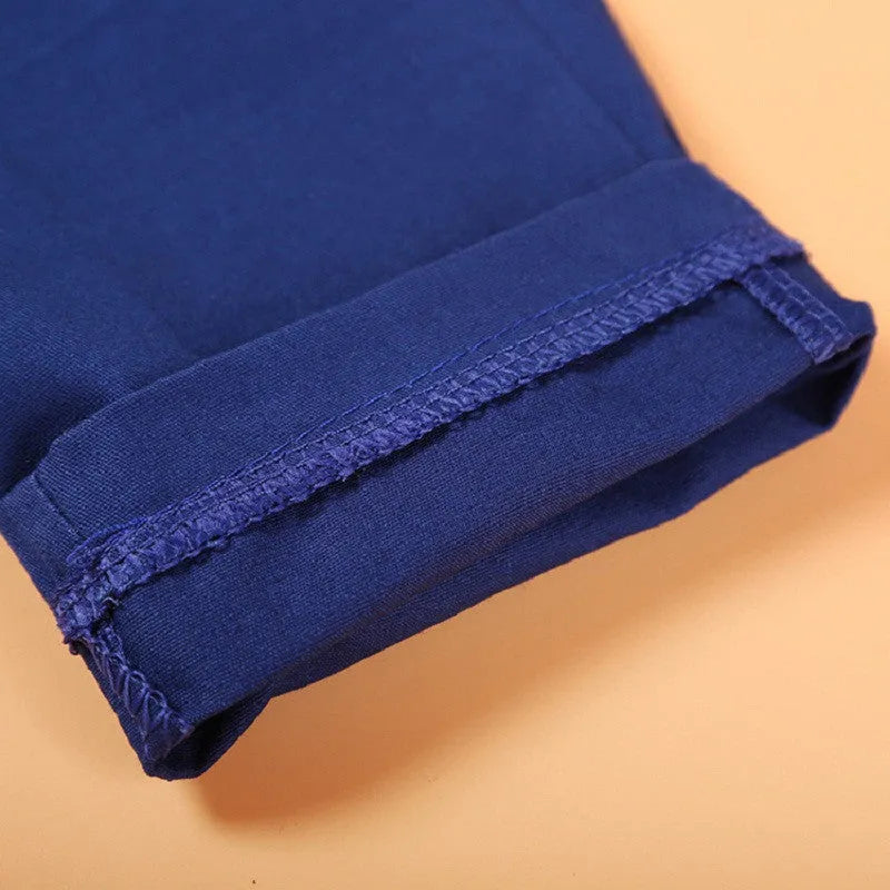 Blue boys' clothing set with cotton turtleneck, vest, tie, and trousers for toddlers