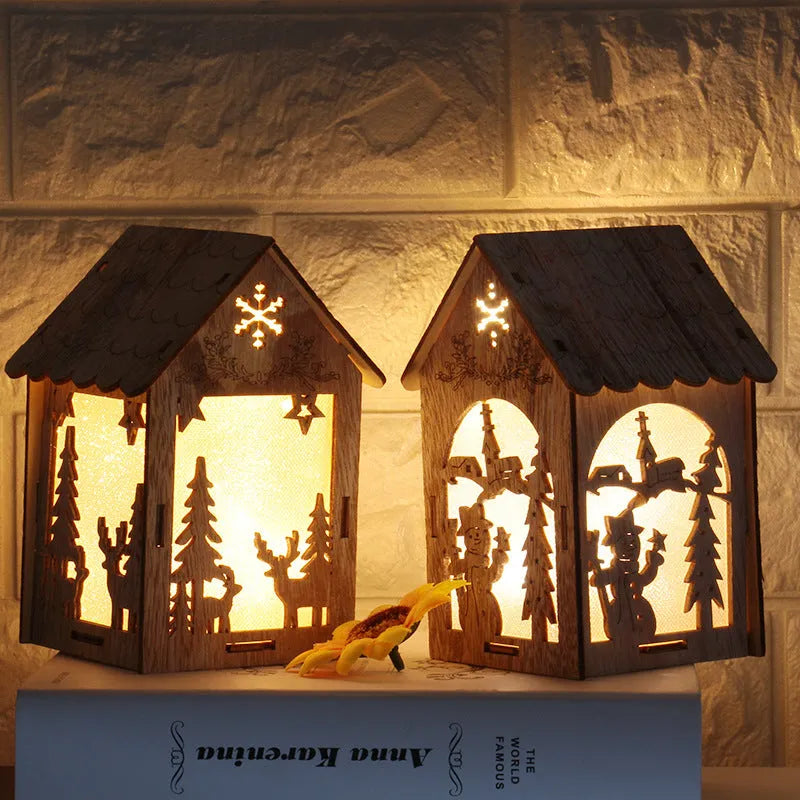 Three wooden Christmas decorations: log bell and two character houses in natural wood colour