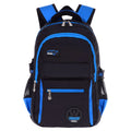 Student backpack in nylon fabric with multiple compartments including side pockets and mesh sections.
